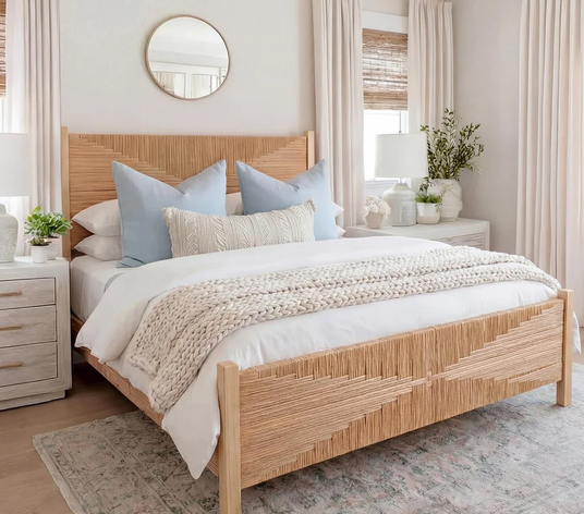 The elegant silhouette of a Yechen rattan bed, representing an enduring design that brings timeless, natural style to any bedroom setting.